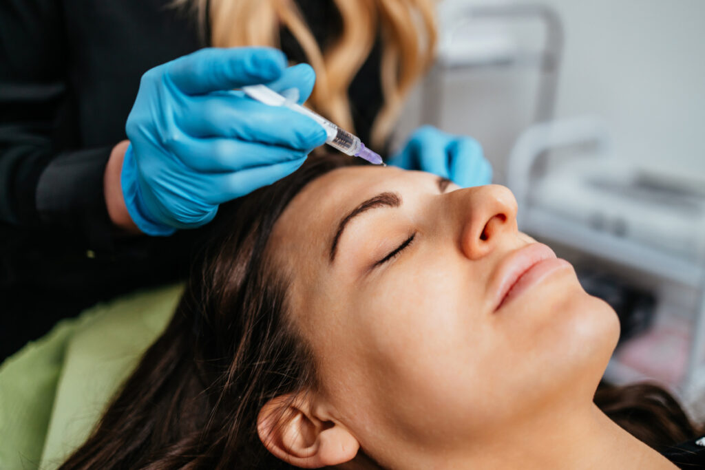 Woman getting Botox injections at a medical spa