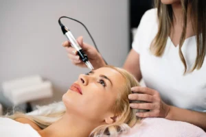 Woman receiving medpa facial treatment in salon.