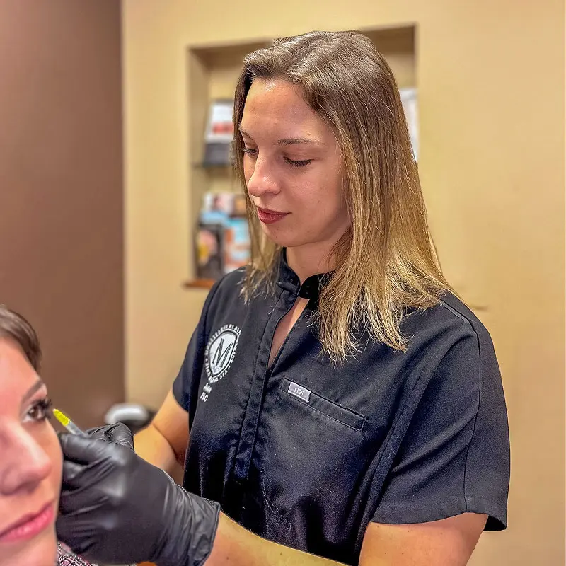 Janna, PA-C, board-certified Physician Assistant and Allergan-certified Injector, with patient